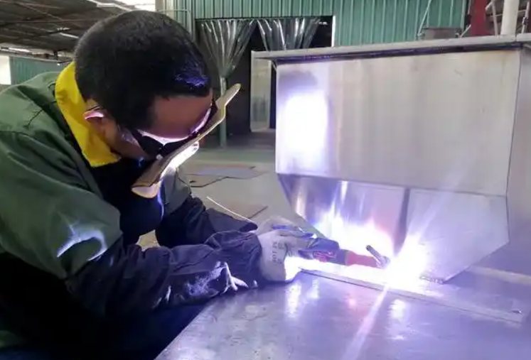 TIG welding a stainless enclosure
